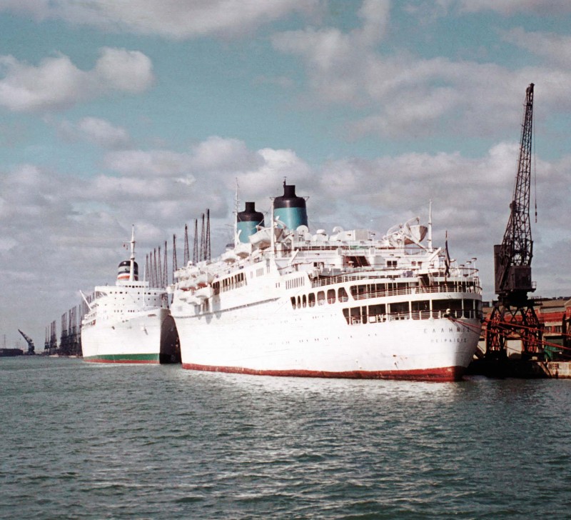 Two liners in the Wstern Docks. In berth 102 on the left is the 32,697grt S.A. Vaal of Safmarine, built in 1961 by John Brown at Clydebank as Transvaal Castle for Union-Castle Line. She later sailed as Festivale, Island Breeze, The Big Red Boat III and The Big Boat before being broken up at Alang in July 2003. On the right in berth 101 is the 18,009grt Ellinis of Chandris Lines, built in 1932 by Bethlehem Shipbuilding at Quincy as the Lurline for Matson Lines. She succumbed to the breakers torch at Kaohsiung in April 1987.