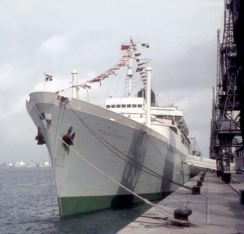 The 19,393grt Principe Perfeito of Cia. Nacional de Navigação at Southampton in September 1968. She was built in 1961 by Swan, Hunter & Wigham Richardson at Low Walker. Due to political instability in the Portuguese African colonies she was laid up at Lisbon in 1976. In April she was sold to the Panamanian company Global Transportation Incorporated, who sent her back to her builders with the intention of converting her into the accommodation ship Al Hasa. These plans never materialized and she moved on to the Sitmar Line, who renamed her Fairsky with the intent of rebuilding her into a cruise ship. However the company decided to build an new ship, the Fairsky of 1984. Sitmar renamed her Vera in 1981 and in 1982 she was sold to the John Latsis company Bilinder Marine Corporation, who renamed her Marianna IX. She entered a new role as an accommodation ship at Jeddah and then Rabigh. In 1984 her name was changed to Marianna 9. In 1992 she was laid up at Eleusis alongside the Windsor Castle, and she remained there until 2001 when she was broken up by Goyal Traders at Alang where she arrived on 8th July. In the background, berthed in the Western Docks are, left to right, Reina del Mar of Union-Castle Line, P&O’s Canberra, P&O-Orient’s Orsova and the SA Vaal of Safmarine.