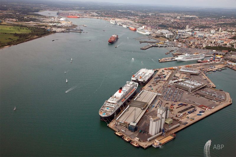 The port on 29th August 2009. At the Marchwood pier on the left are the former Lymington to Yarmouth ferries Caedmon, Cenred and Cenwulf awaiting their fate. At the top of the photo is the 74,496gt LNG tanker Margaret Hill. In the Western Docks, left to right are the 107,517gt Grand Princess of Princess Cruises at the Mayflower Terminal, a UECC car carrier, Fred Olsen’s 28,613gt Black Watch, a Wilhelmsen vehicle carrier, and the 154,407gt Independence of the Sea of Royal Caribbean at the City Terminal. At the Ocean Terminal is P&O’s 77,499gt Oceana, and at the QEII terminal is Cunard’s 148,528gt Queen Mary 2. In front of her are berthed two identical 46,800gt Zodiac Maritime car carriers, the Tokyo Car and the Triumph. A Hapag-Lloyd containership is making headway in the main channel. In the foreground is a Carisbrooke Shipping cargo ship at berth 36.